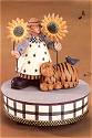 ww8004m girl standing with tabby cat, music box, stars, sunflowers, orange striped cat, bluebird