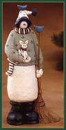 WW2417 Tall thin snowman holding a cat & a broom with blue birds