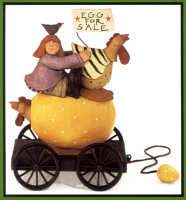 WW7421 A girl, bluebird and a hen ride an egg wagon